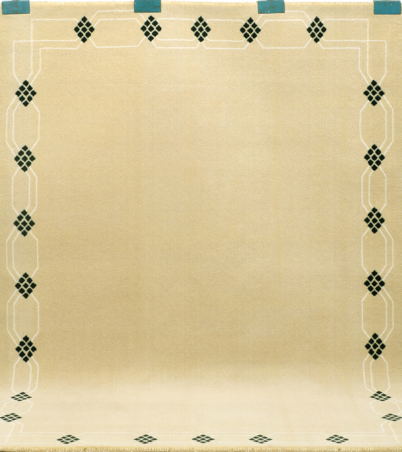 Master weaver crafting a luxury designer rug in India at Floored Homes workshop