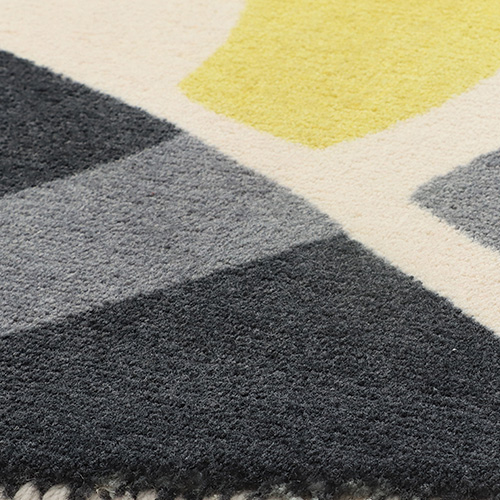 Minimalist geometric designer rug for modern bedroom decor